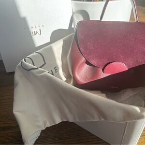 Large Polene Un Handbag in Burgundy.